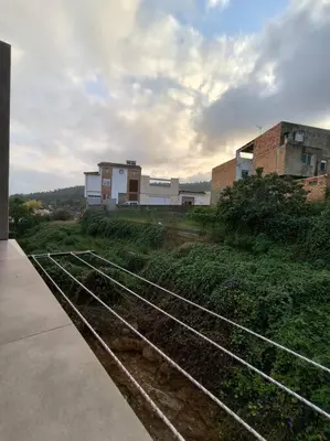a group of train tracks next to some buildings at Casa Otilia, Aventura y Relax in Buñol