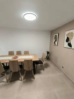 a dining room with a table and chairs at Casa Otilia, Aventura y Relax in Buñol