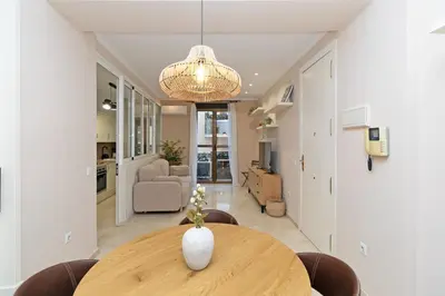 a living room with a table and a vase on it at GuestReady - Urban retreat in Valencia in Valencia