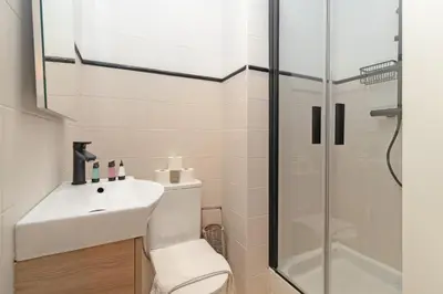 a bathroom with a sink and a shower at GuestReady - Urban retreat in Valencia in Valencia
