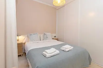 a bedroom with a bed with two towels on it at GuestReady - Urban retreat in Valencia in Valencia