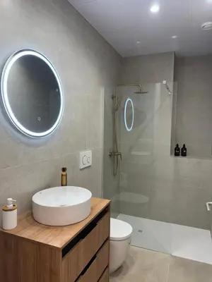 a bathroom with a sink and a shower and a toilet at MAGNO Loft- CIENCIAS in Valencia