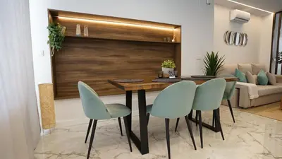 a dining room with a table and four chairs at Modern Loft in Patraix, Valencia - Near City Center in Valencia