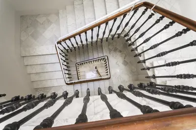 a group of pigeons standing in a stair case at Hotel San Lorenzo Boutique Plaza in Valencia