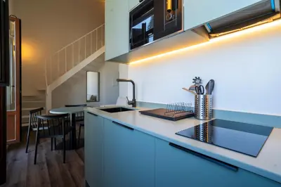a kitchen with a sink and a counter top at VLC HOST - Reina 168 in Valencia