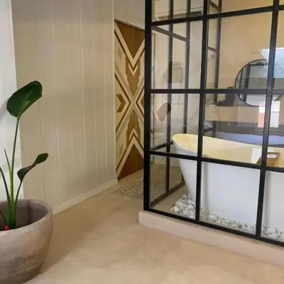 a bathroom with a toilet and a potted plant at Estudio Cama King in Valencia