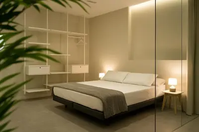 a bedroom with a bed and a glass wall at Formidable Apartments in Valencia