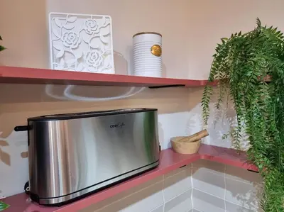 a kitchen counter with a silver appliance on a shelf at SANCHEZ Y LASERNA STAYS Moderno Apartamento en Valencia in Valencia