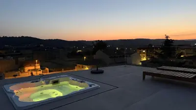 a hot tub on the roof of a building at Bellver Home Apartamentos in Chella