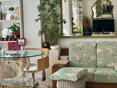 a living room with a couch and a glass table at Casa típica Valenciana in Valencia