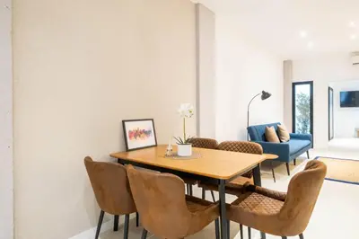 a dining room with a table and chairs at Flats nou Mestalla in Valencia