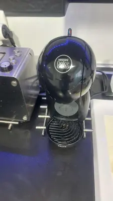 a coffee pot sitting on a counter next to a toaster at Apartamento ÉLITE en Cullera playa San Antonio in Cullera