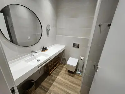a bathroom with a sink and a mirror at HOB Miracle in Valencia