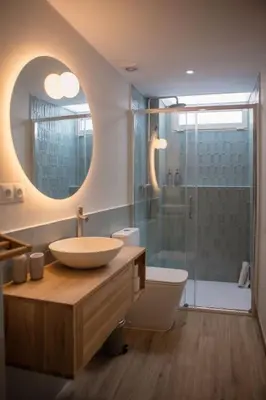 a bathroom with a sink and a shower at Apartamento con terraza Junto a Ruzafa in Valencia