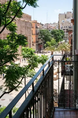 a balcony with a view of a city at Apartamentos Mercado Central in Valencia