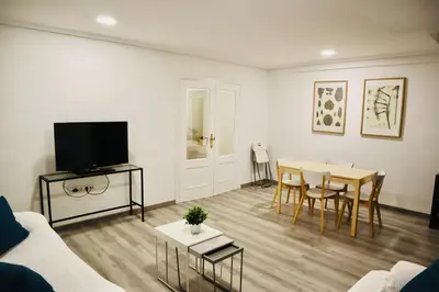 a living room with a couch and a table at Big Flat Ruzafa in Valencia