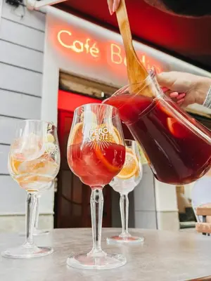 three wine glasses sitting on top of a table at Apartment Casa Novi - Close to Beach, City Center & Metro in Valencia