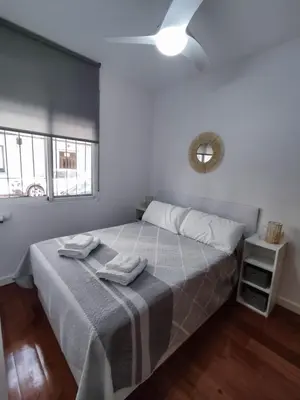 a bedroom with a bed with two towels on it at Benimaclet Deluxe3 in Valencia