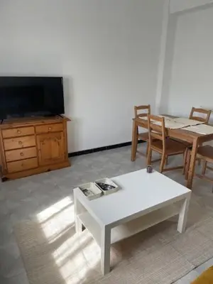 a large bed in a bedroom with a window at Habitación Matrimonio en vivienda para compartir recién reformada in Valencia