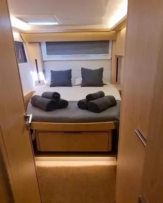 a bedroom with a bed with two pillows on it at Patagonia in Valencia