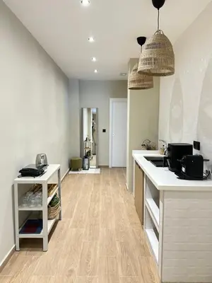 a kitchen with a sink and a counter top at Blue House Valencia in Valencia