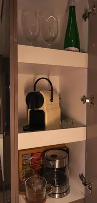 a bathroom with a toilet and a shower and a window at Luxury Catamaran Stay in Valencia Marina in Valencia