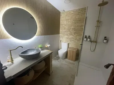 a bathroom with a sink and a mirror at Dream Big with jacuzzi and terrace in Ruzafa in Valencia