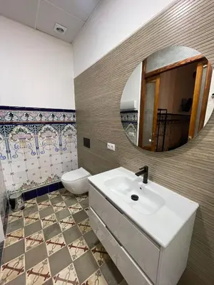 a bathroom with a sink and a mirror at Casa del Cabanal La Playa Azul cobalto in Valencia