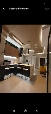 a kitchen with a table and chairs in a room at Apartamento ideal en calle florista in Valencia