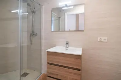 a bathroom with a sink and a shower at VLC HOST - Molinell in Valencia