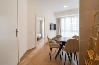 a dining room with a table and chairs at VLC HOST - Molinell in Valencia