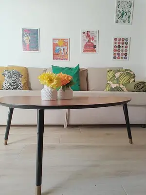 a coffee table in a living room with a couch at Maravillosa casa junto al mar y cerca del centro in Valencia