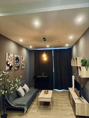 a living room with a couch and a table at CITY FLATS - Avenida Baleares in Valencia