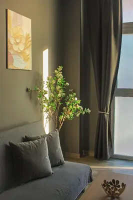a table and chair with a table and a window at CITY FLATS - Avenida Baleares in Valencia
