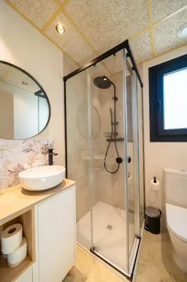 a bathroom with a shower and a sink at Alojamiento Rural 1Respiro Parque Natural Serra Calderona in Serra
