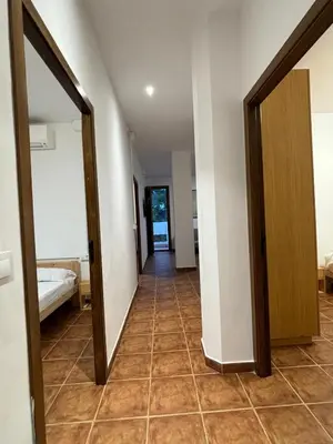 a hallway with a door and a tile floor at Paraiso Natural Unico -Villa Cueva Turche in Valencia