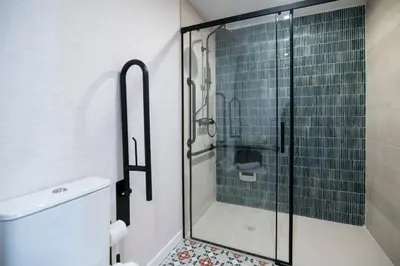 a bathroom with a glass shower with a toilet at District Key - Valencia, Olimpia 2 in Valencia