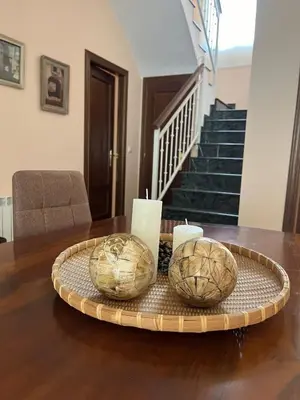 two baskets on a table with two candles on it at Casa Roma in Casinos