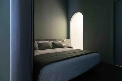 a bedroom with a large bed in a room at Valencia Malvarrosa Beach point green in Valencia
