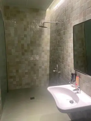 a bathroom with a white sink and a mirror at Valencia Malvarrosa Beach point green in Valencia