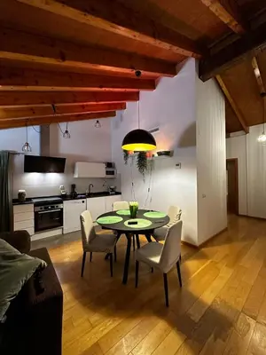 a kitchen and dining room with a table and chairs at Casa Durá in Chulilla