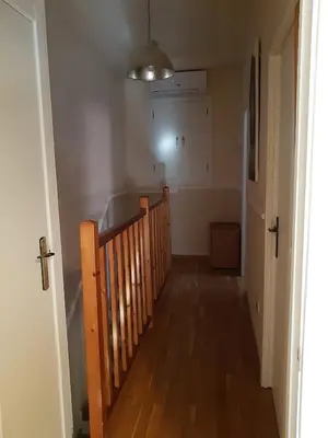 a hallway with a stairway leading to a room at Les Dos Nines in Monserrat