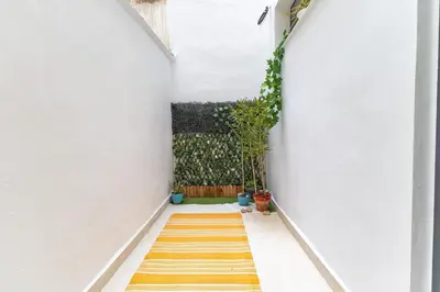 a pair of glass doors in a stair case at Che Loft! Artes y Ciencias in Valencia