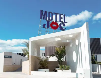 a hotel with a sign on top of it at Motel JOC in Valencia