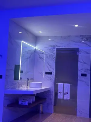 a bathroom with a sink and a mirror at Motel JOC in Valencia