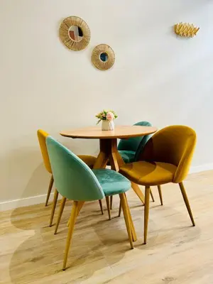 a dining room table with four chairs around it at Stylish Studio near City Center in Valencia