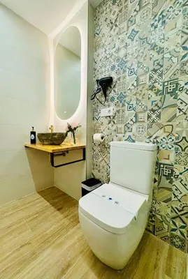 a bathroom with a toilet and a sink at Stylish Studio near City Center in Valencia