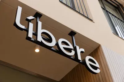a sign on the side of a building at Líbere Valencia Ruzafa in Valencia
