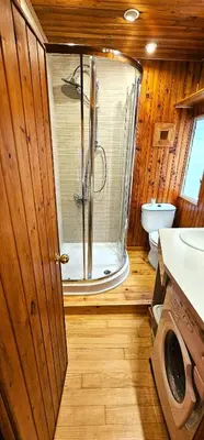 a bathroom with a shower and a toilet in it at Vacansis Atico Loft El Mercat in Valencia
