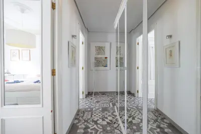 a hallway with a glass walk in shower at Apartment Ruzafa 4 bedroom in Valencia